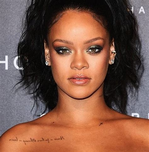 rihanna collarbone tattoo|rihanna star tattoo.